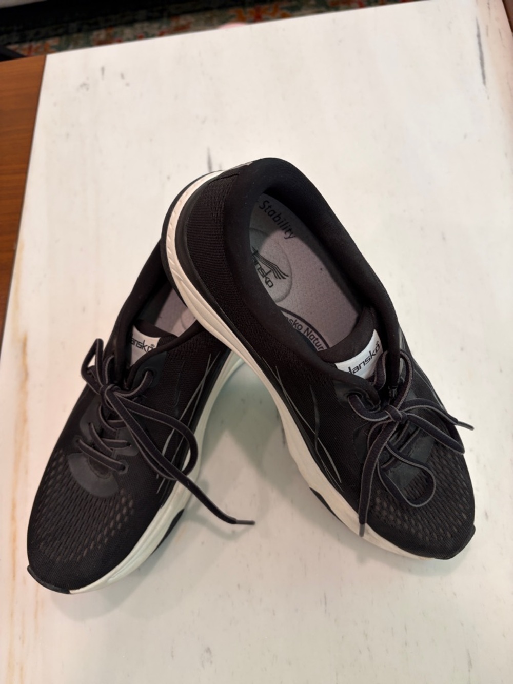 Dansko Black and White Women’s Lace-Up Sneakers